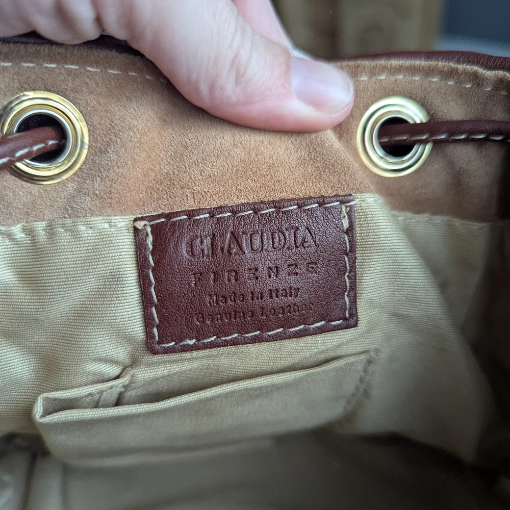 Claudia Firenze Leather Bucket Bag With Pull Top And Tassels.